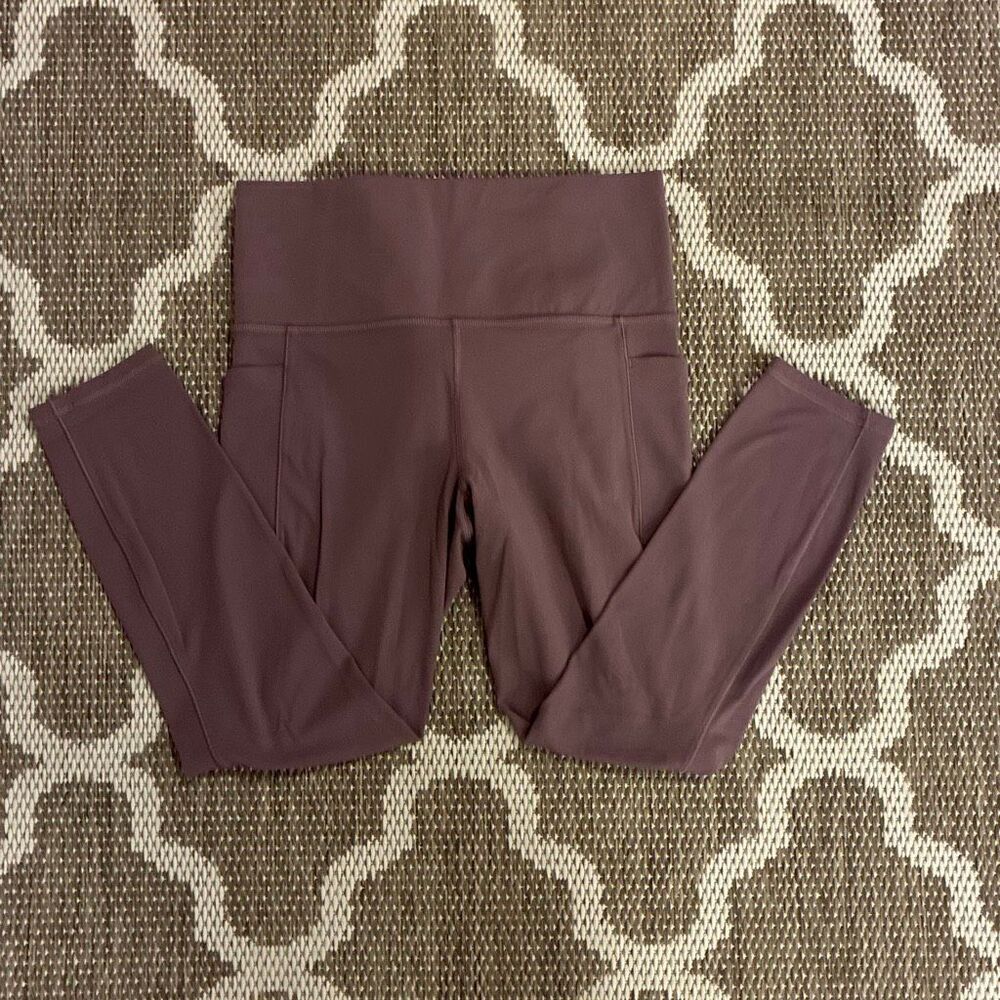 Athleta salutation stash 7/8 tight leggings women’s size medium